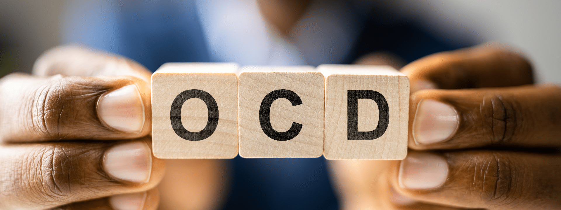 Individual repeatedly checking an object showing compulsive behavior and distress