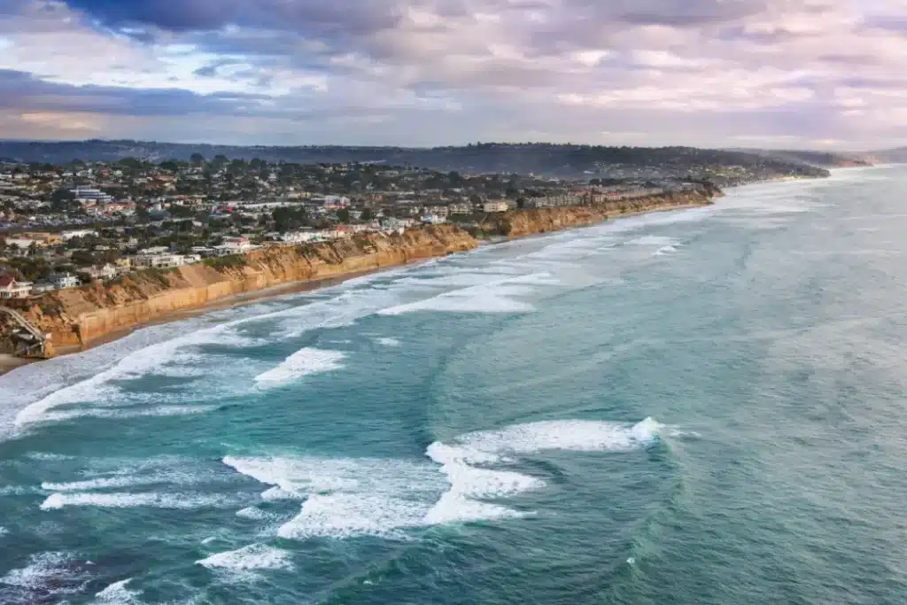 Scenic coastal view of Solana Beach with person in foreground experiencing anxiety or mental health distress