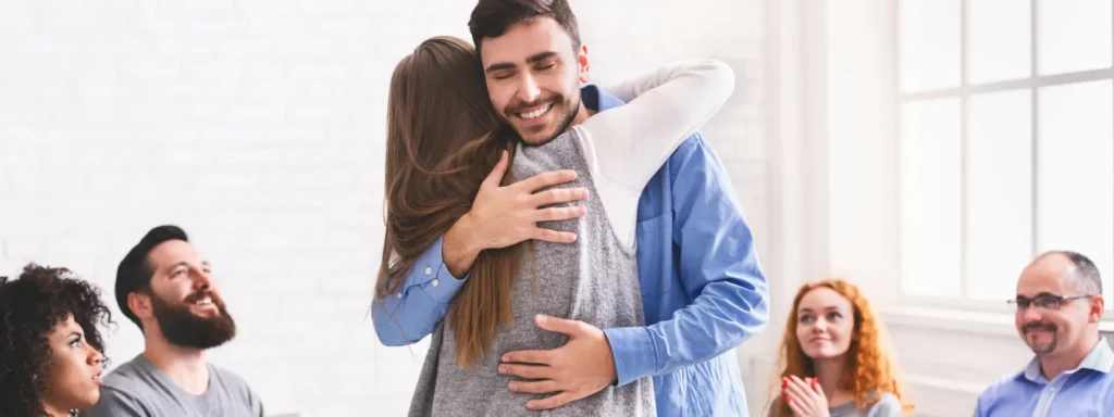 Person receiving support to overcome social anxiety and build confidence.